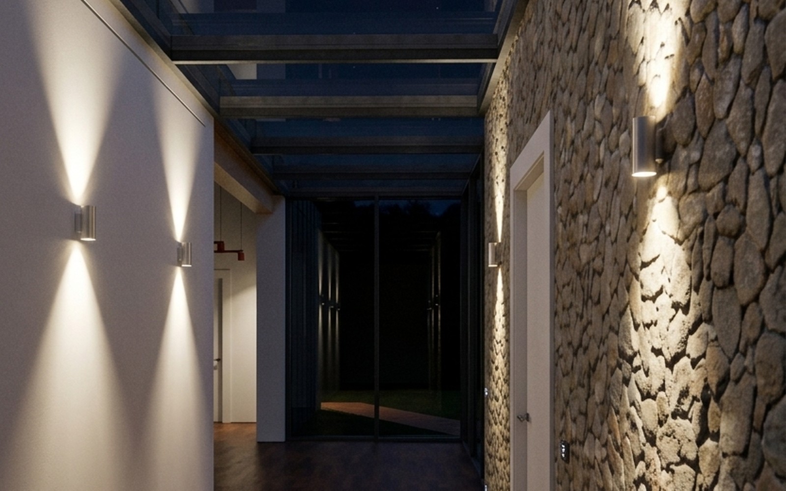Render notturno del corridoio della villa illuminato dalle applique sulla parete in pietra